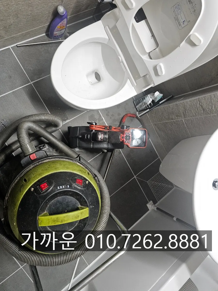 Suction retrieval of a perfume bottle from a toilet